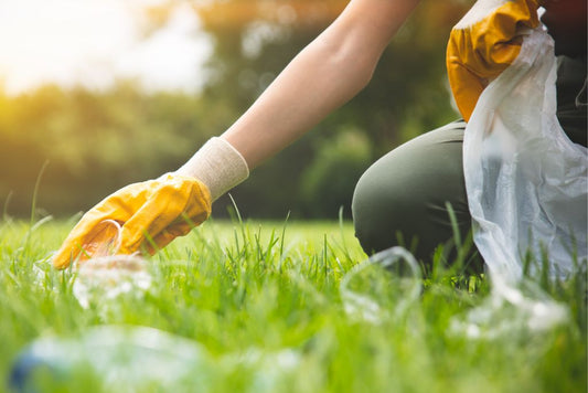 cleaning waste using gloves and trash bag