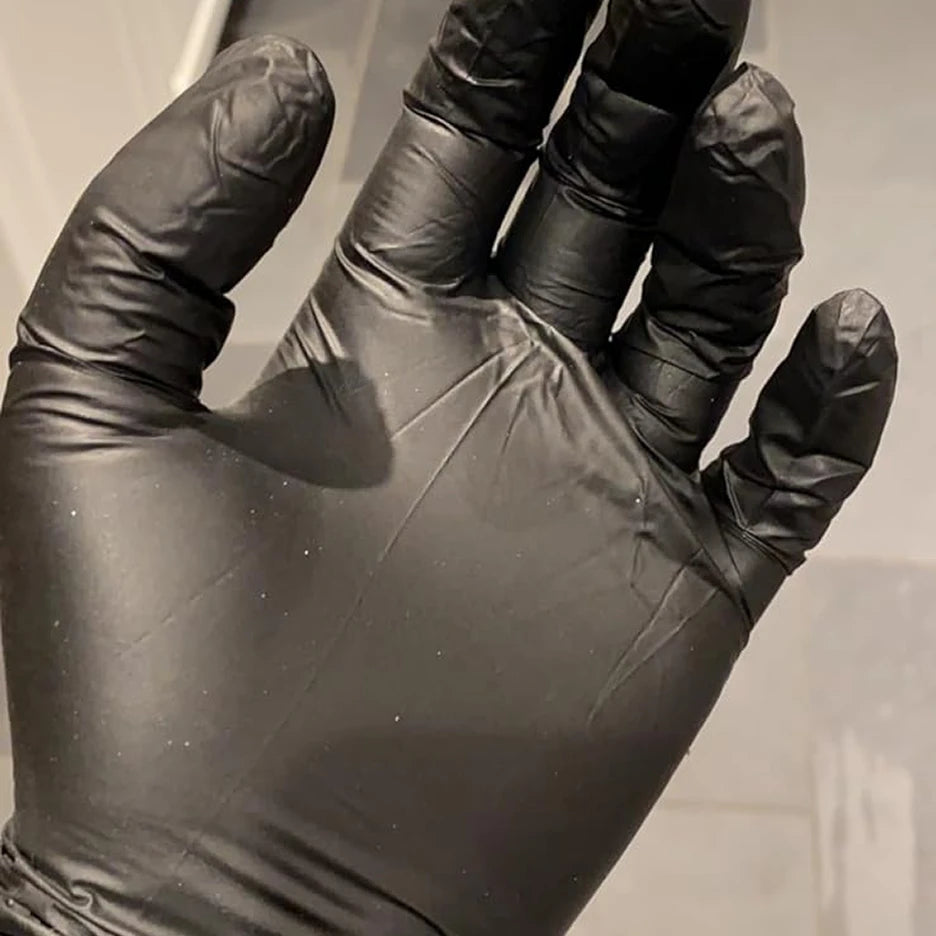SureSafe Professional Obsidian black nitrile gloves, 5 mil thickness, providing a snug and durable fit for industrial work.